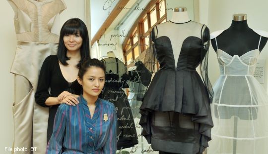 jade swee,- in blk, and letitia phay, dress designers, melwee