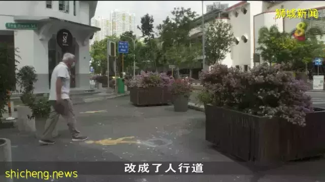 停车位改成人行道试行四个月 商家反映生意跌