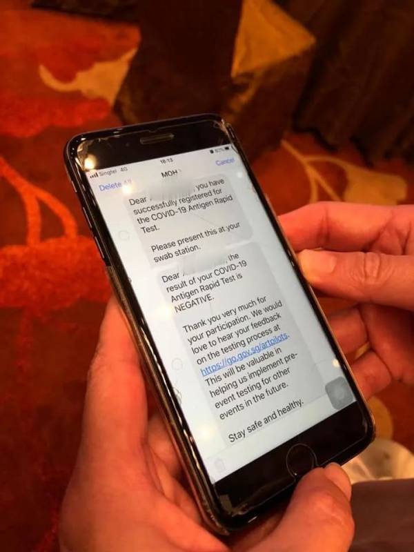 新加坡试行大型活动国际能源周，贸工部长亲自体验快速抗原检测，15分钟出结果