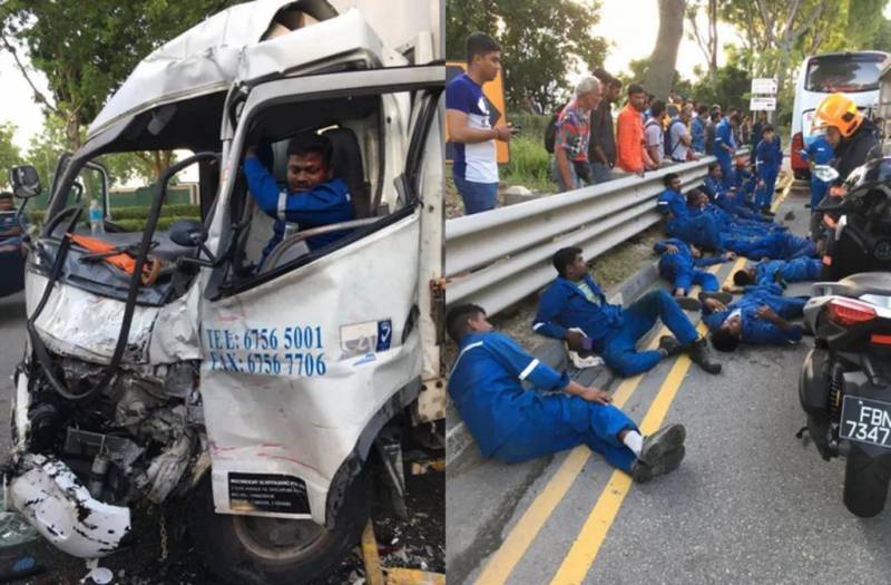 新加坡裕廊恐怖車禍！車頭起火，十幾個客工從翻車大巴中爬出